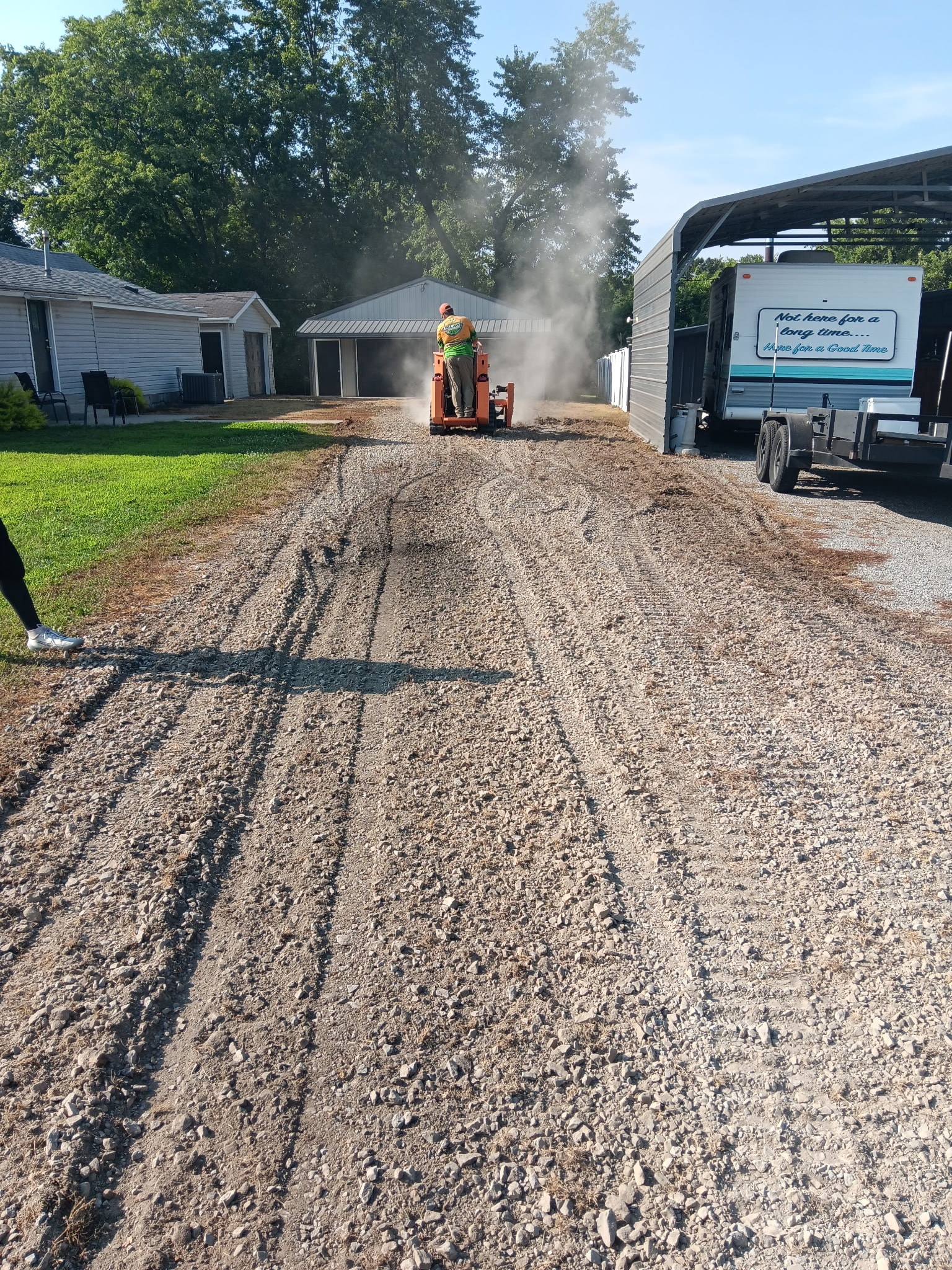 Gravel driveway repair and grading