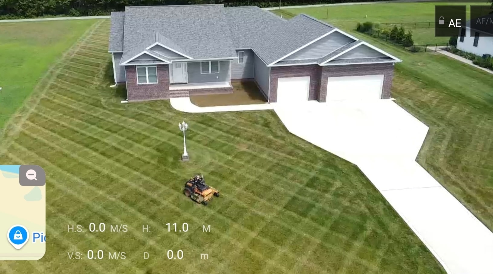 Aerial view of residential lawn after mowing